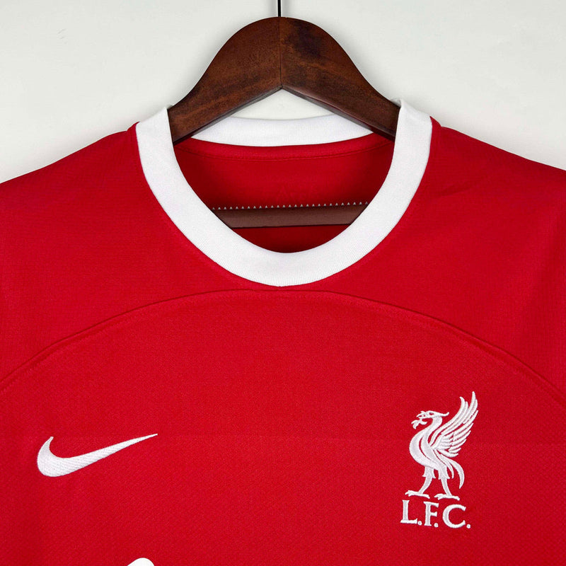 camsia-liverpool-home-casa-i-1-versao-torcedor-fan-masculino-masculina-23-24-oficial-original-vermelho-vermelha-nike-branco-branca-standard-chartered